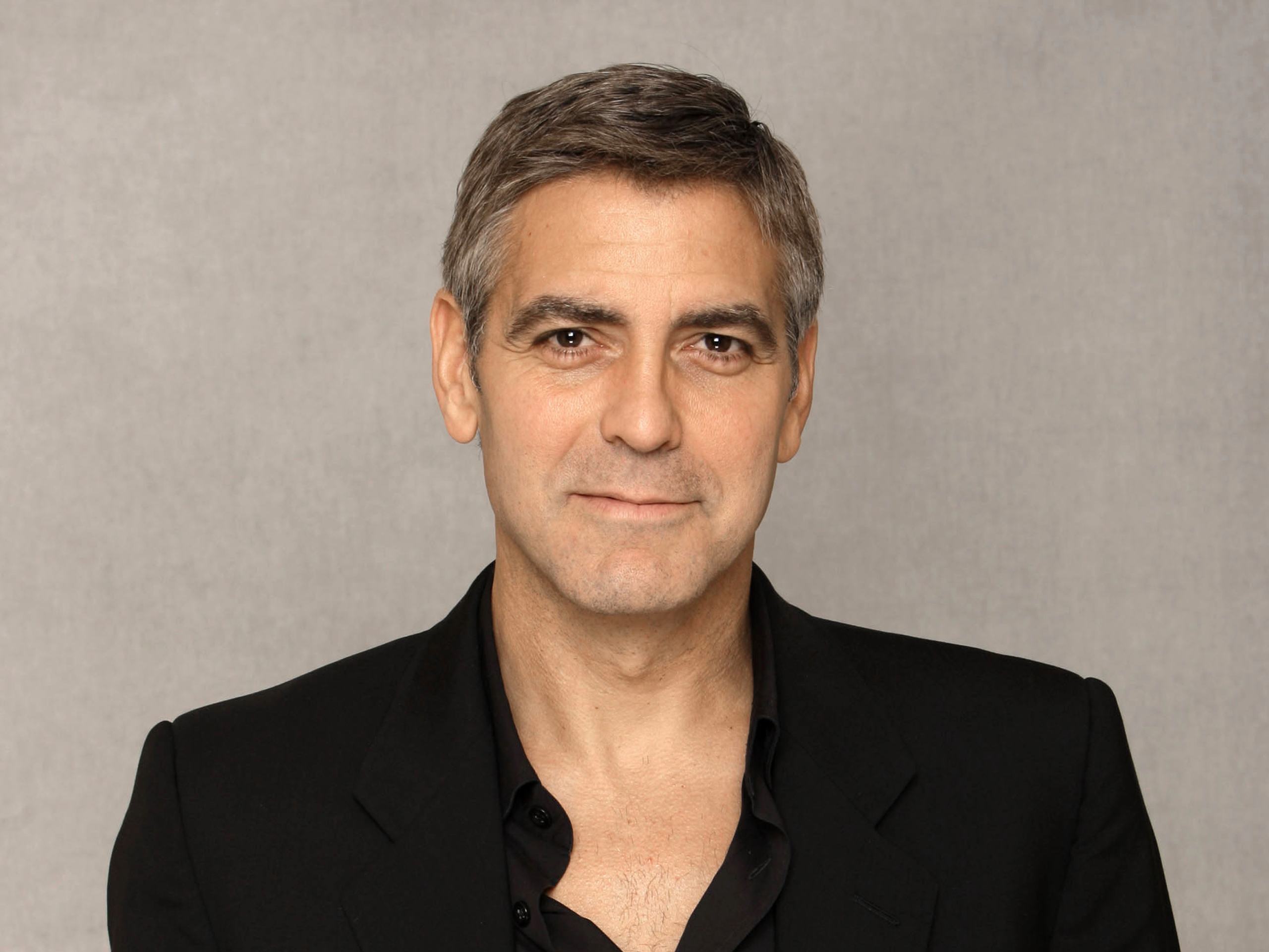 Actor George Clooney poses for a photograph in Beverly Hills Calif., Monday, Feb. 4, 2008. (AP Photo/Kevork Djansezian)